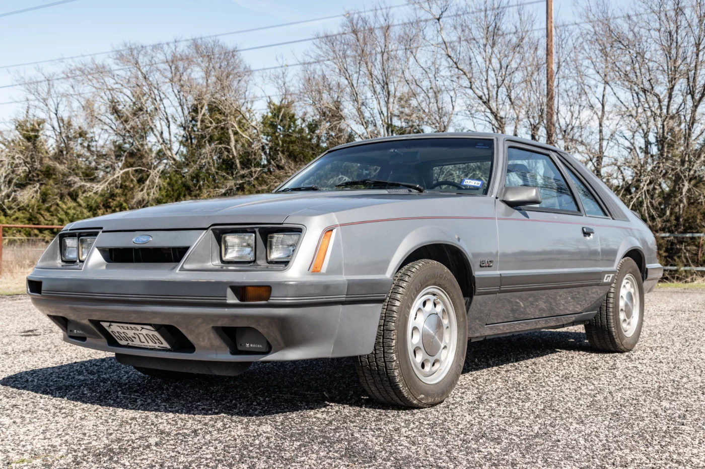 Silver 1985 Ford Mustang