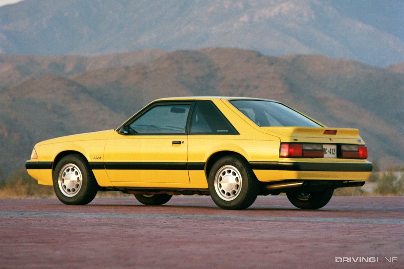 Medium Yellow 1987 Ford Mustang