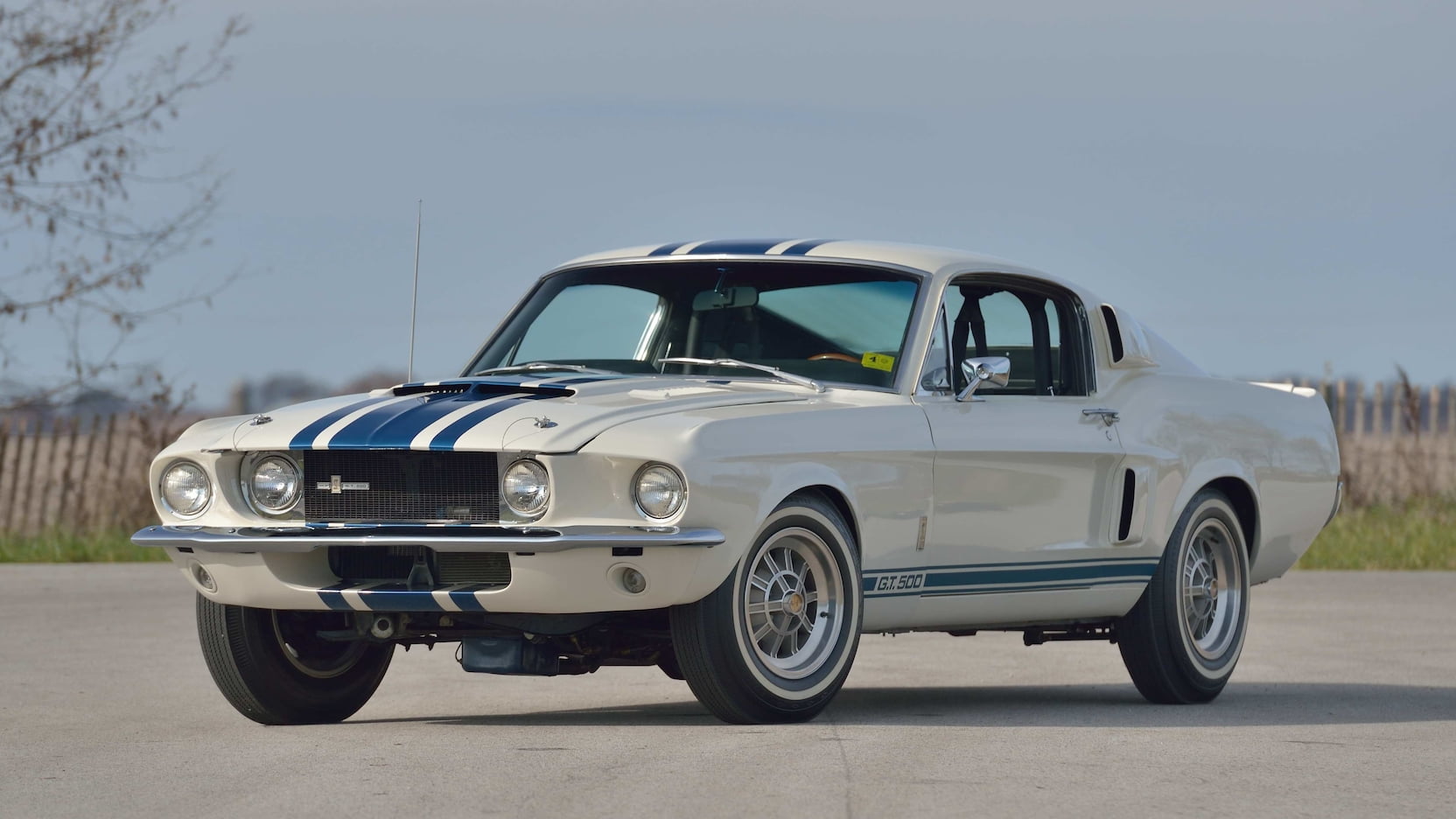 White 1967 GT500 Super Snake with blue racing stripes