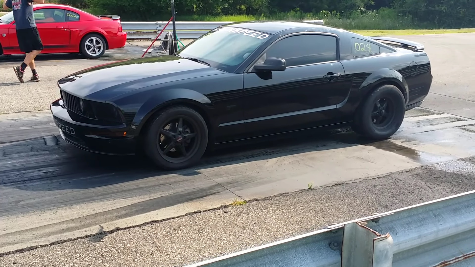 Video: 2006 Ford Mustang GT vs 2003 Mach 1 Mustang Shoot Out