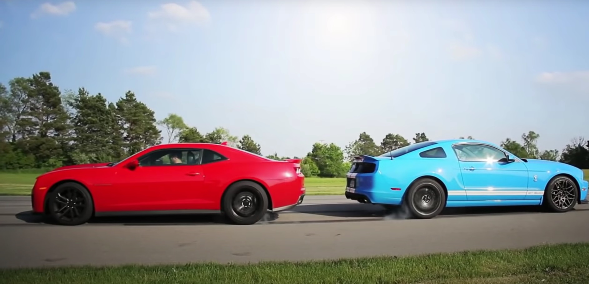 Video: 2013 Ford Mustang Shelby GT500 vs 2012 Chevrolet Camaro ZL1 Showdown