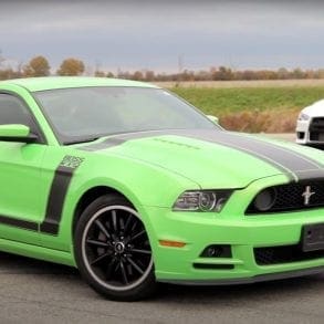 Video: 2013 Ford Mustang Boss 302 vs. 2013 Mitsubishi Lancer Evolution MR