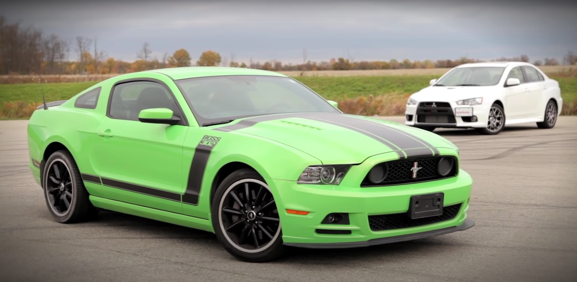 Video: 2013 Ford Mustang Boss 302 vs. 2013 Mitsubishi Lancer Evolution MR