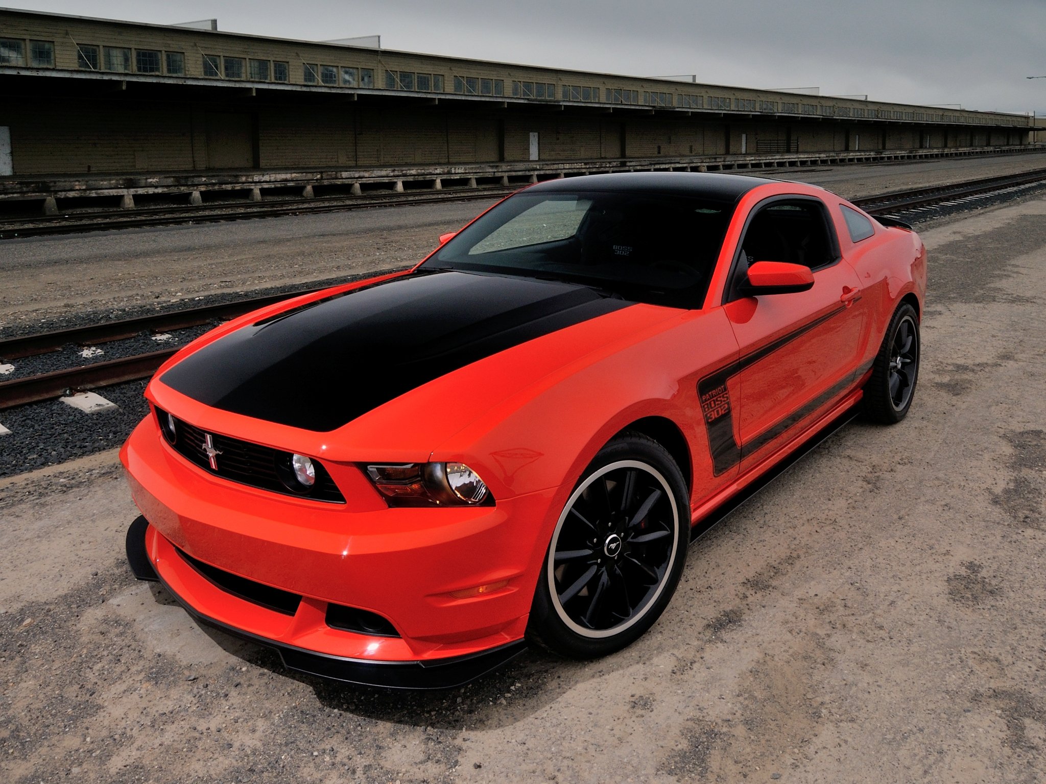 Red and black 2012 Boss 302 Ford Mustang