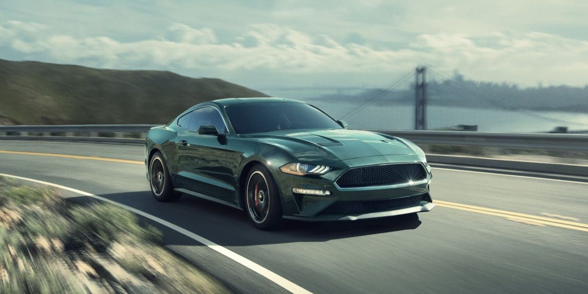 Green 2019 Ford Mustang Bullitt on highway