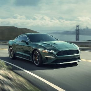 Green 2019 Ford Mustang Bullitt on highway
