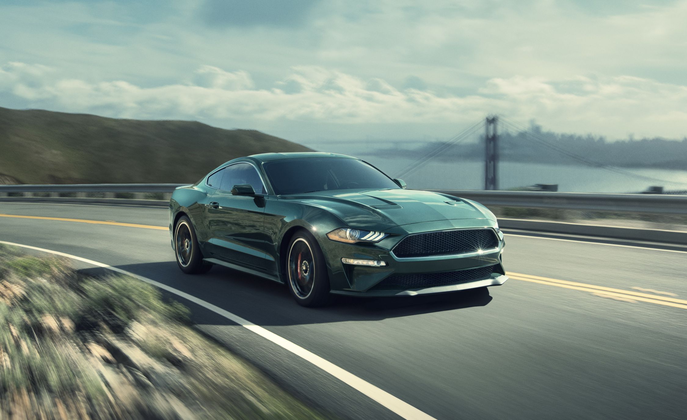 Green 2019 Ford Mustang Bullitt on highway