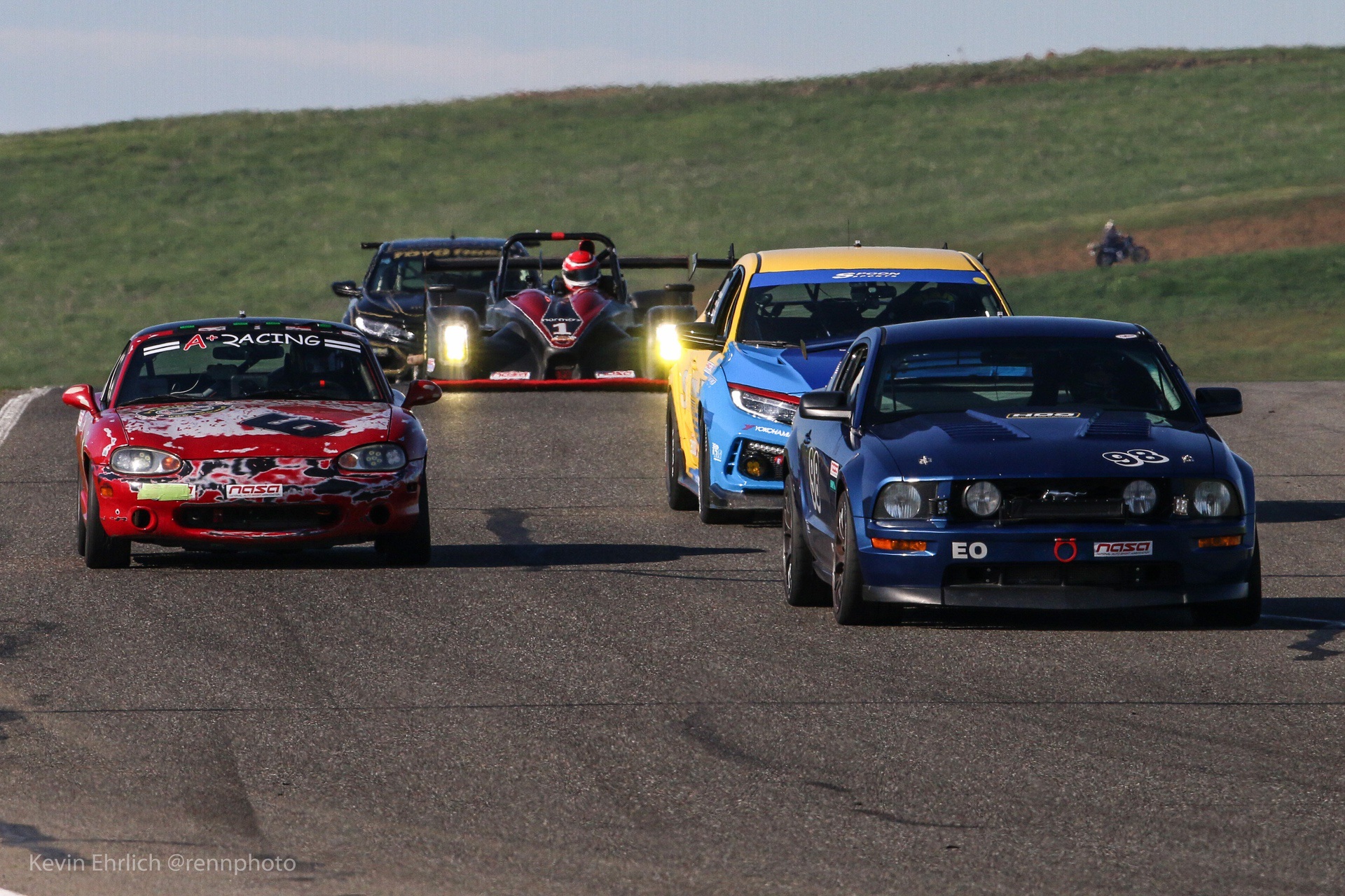2008 Ford Mustang in front of other cars at Thunderhill 2021