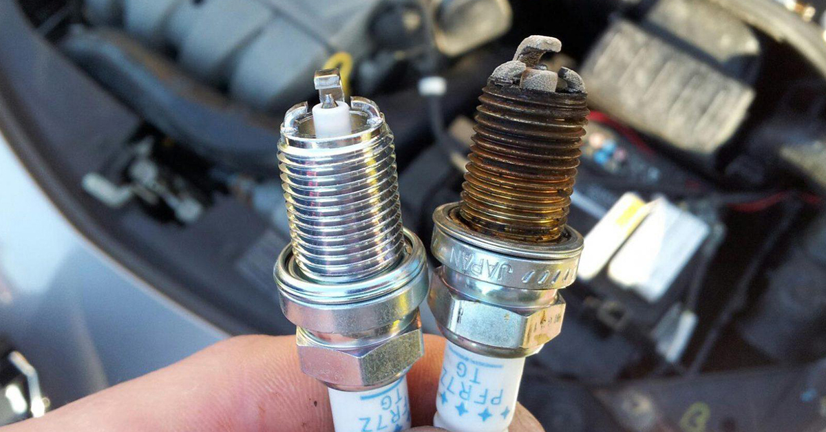 Brand new and worn out spark plugs