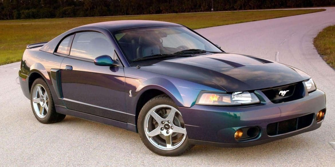 Fourth gen blue Ford Mustang Cobra on a test track