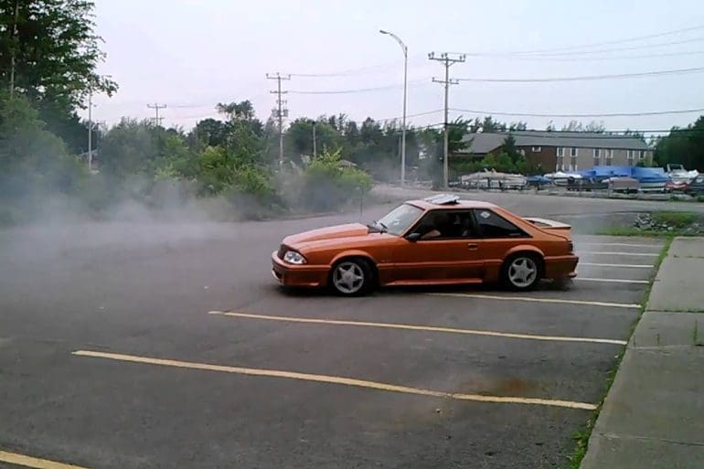 1988 Mustang GT Doing Doughnuts On A Parking Lot