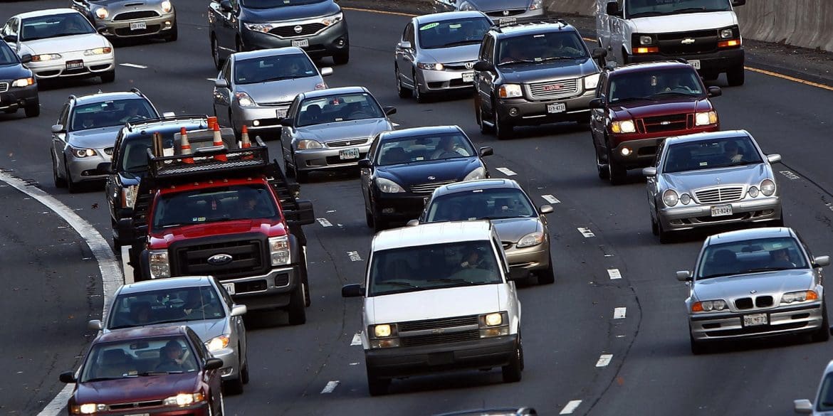 multiple cars driving on the freeway