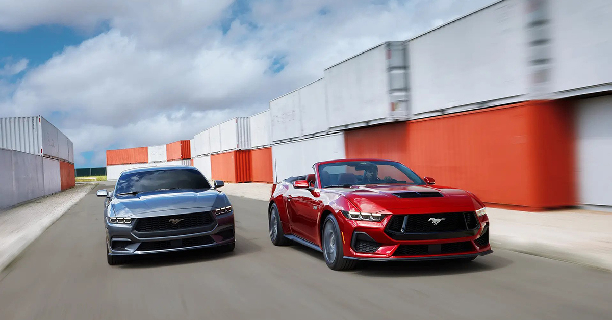 2024 gray Mustang coupe and red Mustang convertible