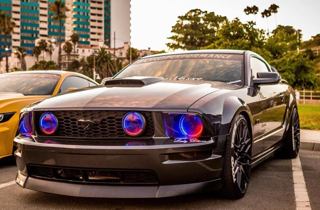 Ford Mustang with colourful aftermarket LED headlights