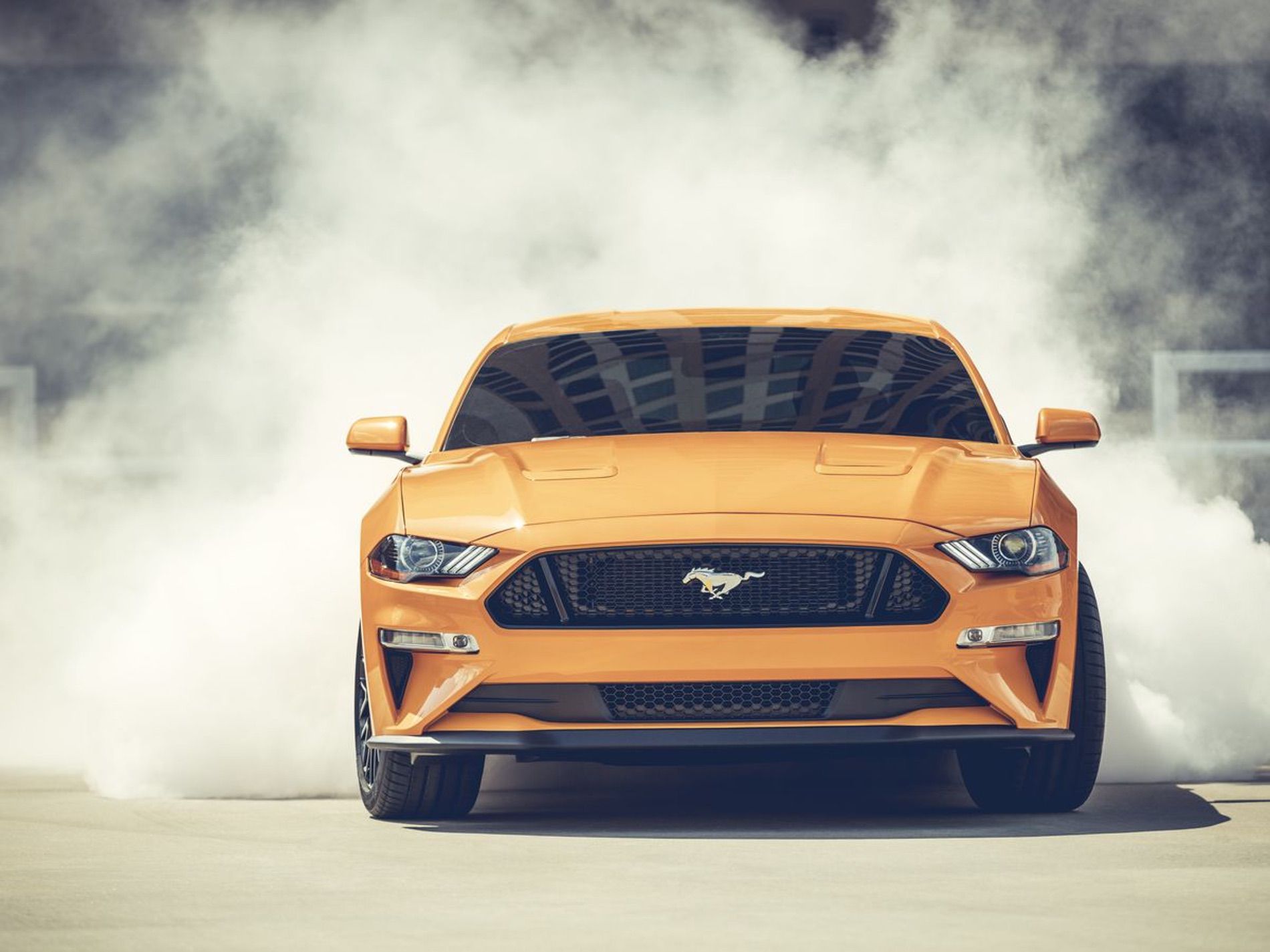 Ford Mustang accelerating on track