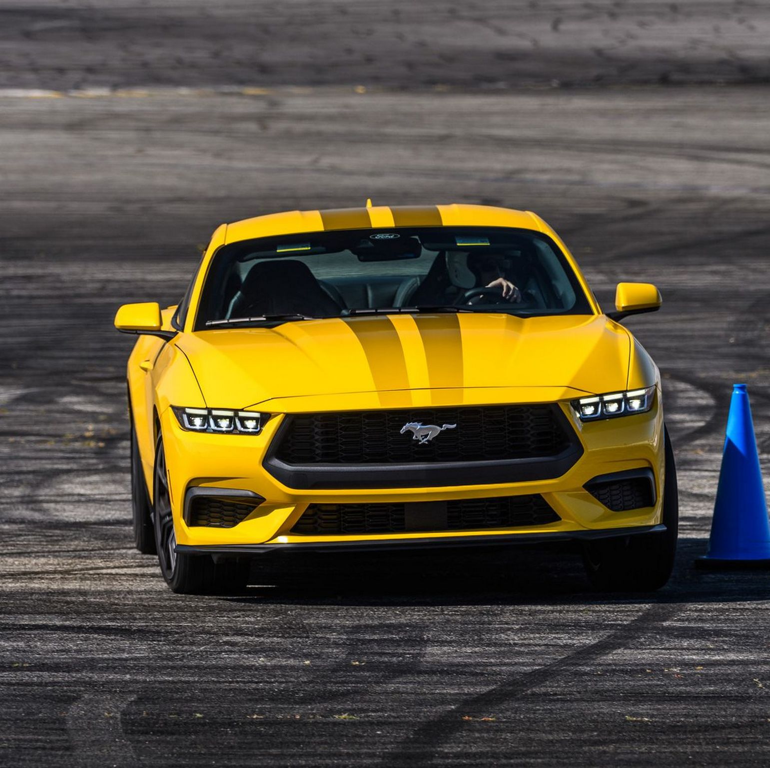 Front view of yellow 2024 Ford Mustang EcoBoost