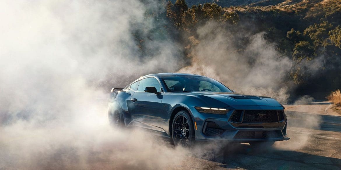 angled view of mustang doing burnout